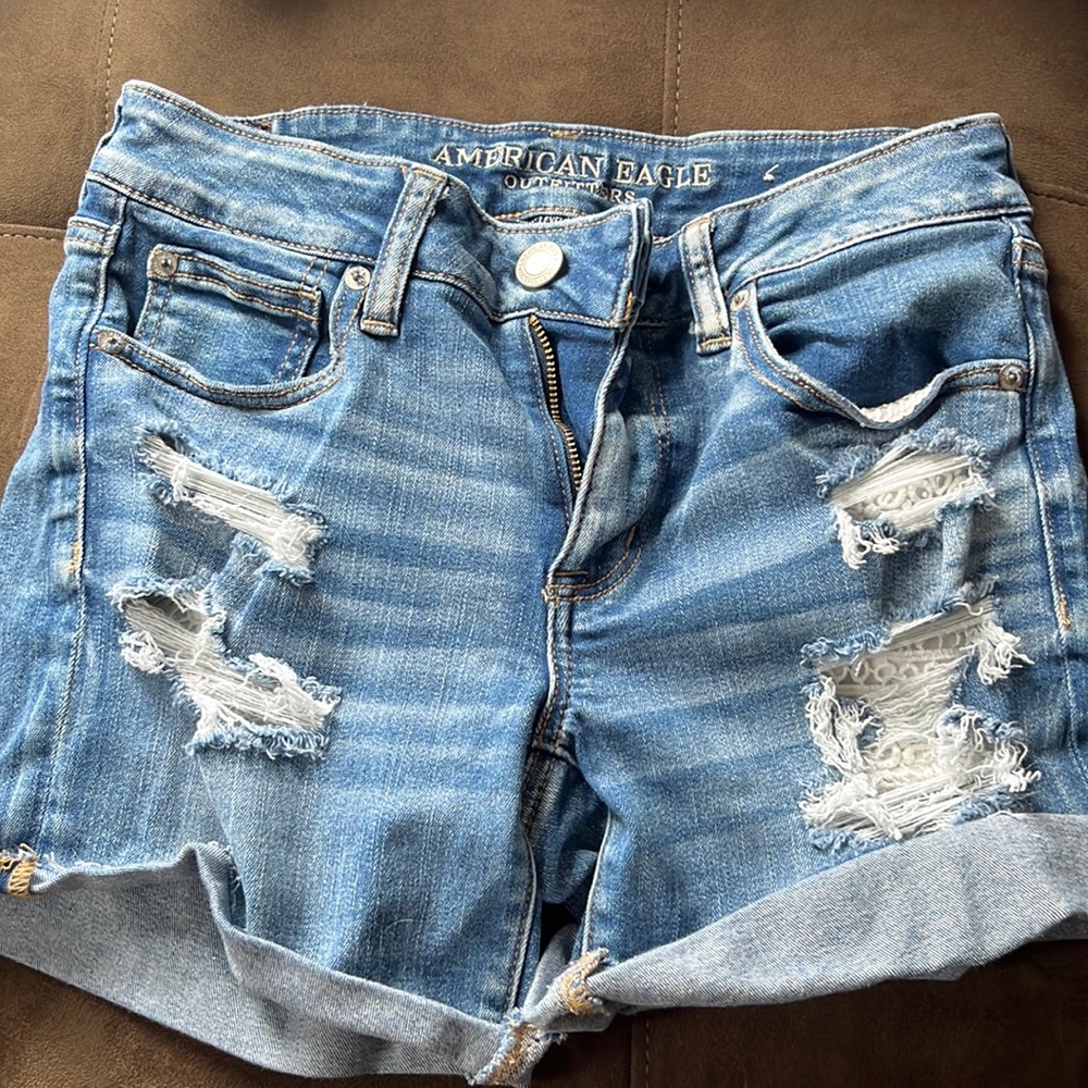 Selling size 8 American eagle jean shorts with tears